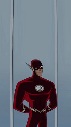 the flash is standing in front of some tall poles with his hands on his hips