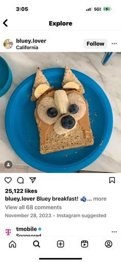 a blue plate topped with a piece of bread covered in banana and kiwi slices