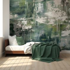 a bed sitting in front of a green painting on the wall next to a window