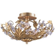 a gold ceiling light with flowers and leaves on the bottom, against a white background