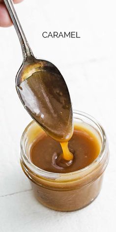 a spoon full of caramel sauce being drizzled on top of it