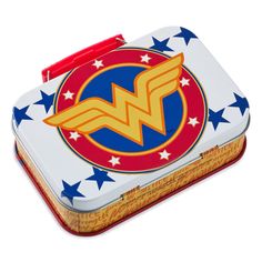 the wonder woman lunch box is decorated with stars and an emblem on it's lid