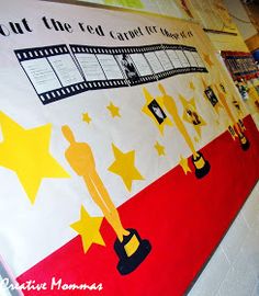 this is a photo of a classroom wall decorated with hollywood stars and the words, out the red carpet theater