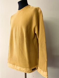 Introducing a classic piece of men's fashion from the 90s - this Vintage Sweater by Amerigo Vespucci is a true gem! Made from 100% wool in a mustard yellow hue, this sweater exudes a warm and cozy vibe, making it a must-have addition to any vintage-loving gentleman's wardrobe.  Revive your wardrobe with this unique, vintage treasure that effortlessly combines comfort and style. Men's Vintage 90's pullover. Ribbed crew neckline, cotton shoulder in set with the same cotton repeated on the sleeve c Fashion From The 90s, Amerigo Vespucci, Pull Vintage, Gentleman's Wardrobe, Mens Pullover, Vintage Pullovers, Vintage Sweater, Pullover Men, Vintage Sweaters