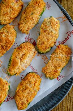 some fried food is sitting on a paper plate