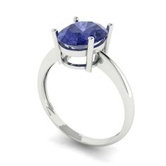 a ring with a blue stone in the center