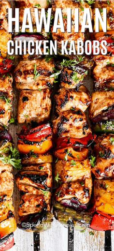 the hawaiian chicken kabobs are piled on top of each other and ready to be grilled