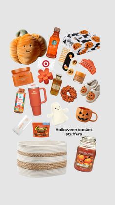 an assortment of halloween related items are arranged in the shape of a pumpkin