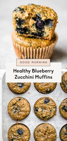 healthy blueberry zucchini muffins on a baking sheet