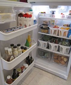 an open refrigerator filled with food and condiments