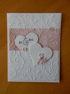 a wedding card with a heart on it