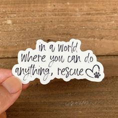 someone holding up a sticker that says in a word where you can do anything, rescue