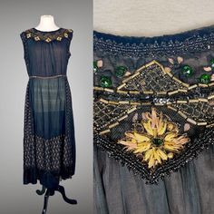 This is such a unique and gorgeous dress and I'm a little stumped on dating her, but my best bet is that she's in the realm of later 1910s to early 1920s. Made of fine black cotton silk blend with a semi-sheer hand with insertions of embroidered eyelet panels placed vertically down the skirt sides and horizontally across the front and back hem. Tiered silk separates each eyelet panel from waist down to hem. The neckline is styled with a velvet trimmed eyelet collar that is partially hidden by the large amount of embellishments including jet black beadwork, faceted green jewels, gold tone tube beads, black mesh net embroidered with silk floss flowers, gold metallic bullion thread and sequins! The eyelet insertions are also trimmed in black beaded strips and fringed hems. A pink and black si 1910 Fashion Women, 1920s Couture, 1920s Fashion Dresses, Gold Bullion, Velvet Trim, 1920s Fashion, Eyelet Dress, Historical Dresses, Beaded Trim