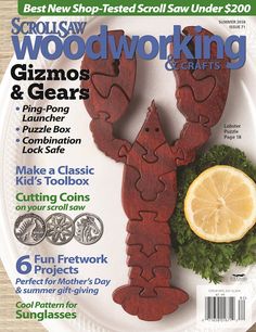 the cover of woodworking crafts magazine featuring a lobster and lemon slice on a white plate