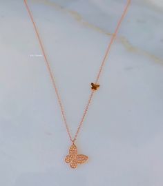 Metal: 14K Rose Gold White and yellow can be ordered. It will take approx. 3 to 4 weeks to make and ship. The same goes for if you are ordering more than 1 rose gold. The 1 rose gold is in stock and will be shipped within 2 days. Stone: Diamond Stone Shape: Round Diamond Weight: .15 ctw Weight of Necklace: 1.83 grams Width of chain: 1.00mm Type of Chain: Rolo Chain Dimensions Of Diamond Butterfly: 10.02mm Long Dimensions Of Plain Butterfly: 5mm Long Type of clasp: Spring Clasp Length of Chain: C Dainty Rose Gold Cubic Zirconia Diamond Necklace, Rose Gold Diamond Necklace With Delicate 14k Gold Chain, 14k Rose Gold Diamond Necklace With Delicate Chain, Fine Jewelry Rose Gold Diamond Necklace With Delicate Chain, 14k Rose Gold Diamond Pendant Necklace, Rose Gold 14k Diamond Pendant Necklace, 14k Rose Gold Diamond Necklace With Adjustable Chain, Rose Gold 14k Gold Diamond Clavicle Necklace, Rose Gold Pendant Diamond Necklace