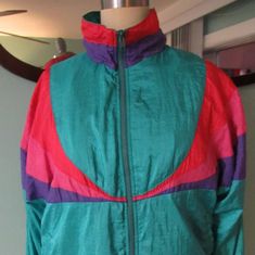 Vintage 90s 80s Wind Breaker Jacket In Mint Condition Working Zipper Rock Creek Casuals Size Medium But Will Also Fit Small Medium Will Send Same Or Next Day I Have Another Similar Listing Retro Party Costume Windbreaker Jacket Coat Fall Autumn Halloween Pull Over Free Bundle Trade Sell Sale Offer Freebies Ilgwu Nwot Blue Pink Purple Yellow Green Teal Rainbow Fashion One Of A Kind Weird 1980 1990 Color Block Track Suit Jumpsuit 90s Style Pink Long Sleeve Outerwear, Retro Pink Windbreaker, Retro Pink Long Sleeve Windbreaker, 90s Style Pink Windbreaker For Spring, Retro Pink Windbreaker For Fall, 90s Pink Spring Windbreaker, Vintage Pink Windbreaker For Fall, Retro Green Windbreaker For Spring, Retro Pink Windbreaker For Winter