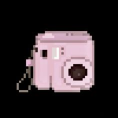 an old pink camera is shown with the pixellated image on it's side