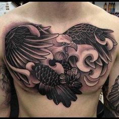 a man with an eagle tattoo on his chest