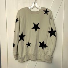 White Sweatshirt With Black Stars!! Oversized And Nice Quality Material! Size Medium Never Worn!