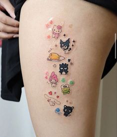 the girl has many stickers on her thigh