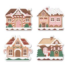 four stickers with different houses and trees in the shape of snowflakes on them