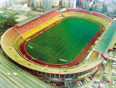 an aerial view of a soccer stadium in the city