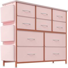 a pink dresser with six drawers and four bins on each drawer, against a white background