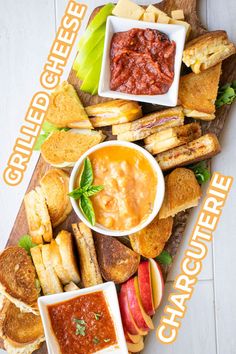 an overhead view of sandwiches and dips on a cutting board with the words chaps d'oeuvres written above them