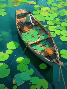 a person in a row boat on the water surrounded by lily paddlings and green leaves