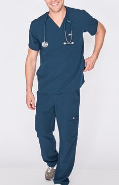 Men's performance scrub top with a modern, streamlined look with one chest pocket and two hidden side pockets. Scrubs Outfit Ideas, Male Scrubs, Chisec, Doctor Uniform, Black Figs, Outfit Ideas Men, Scrubs Nursing Uniforms, Scrub Suit