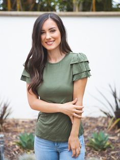 Upgrade your wardrobe with our stunning Rebekah Top! This top is a must-have for any fashion-forward woman looking to add a touch of elegance to her closet. The ruffle sleeves add a fun and flirty touch to this classic piece, making it perfect for any occasion. Whether you're dressing up for a last-minute lunch date or running errands on the weekend, this top has got you covered. Size: ( Slim Fit) Small 0-4 Medium 6-8 Large 10-12 XL 12-14 Custom Coffee Mugs, Her Closet, Maxi Skirt Dress, Lunch Date, Woman Looking, Graphic Apparel, Custom Coffee, Ruffled Sleeve Top, Ruffle Sleeves