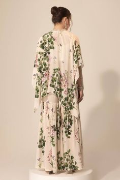 Ivory crepe pleated asymmetric cape with botanical print and sequins, stones and beaded hand embroidered neckline. Comes with sharara. - Aza Fashions Asymmetric Cape, Sharara Set, Embroidered Neckline, Botanical Print, Fashion Wear, Set For Women, Flared Sleeves, Aza Fashion, Botanical Prints