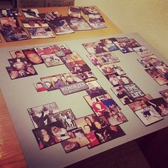 a table topped with lots of pictures on top of it