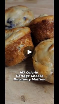 blueberry muffins sitting on top of a cutting board with the words, 6 calories cottage cheese blueberry muffins