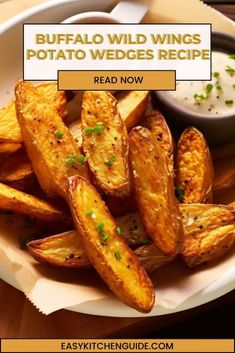 buffalo wild wings potato wedges recipe on a plate with ranch dip in the background