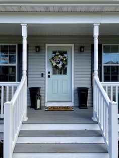 a front porch with steps leading up to the door