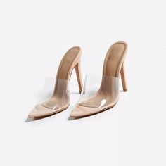 Step into style with these Nude Patent Leather transparent Mule Heels. The sleek design and transparent detail add a modern touch to any outfit, perfect for a sophisticated and chic look. Color: nude Heel Type: stiletto heel Heel height: 4.33 inches/ 11 cm Toe：pointed toe Handcrafted US sizing. Fits true to size. Chic Open Toe Heels With Transparent Straps, Chic Evening Heels With Clear Strap, High Heel Heels With Transparent Straps, High Heel With Transparent Straps, Modern Heels With Transparent Straps And Open Heel, Trendy Formal Heels With Translucent Outsole, Sheer High Heel Summer Heels, Trendy Clear Pointed Toe Heels, Chic Clear Heels