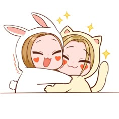 two girls hugging each other while wearing bunny ears