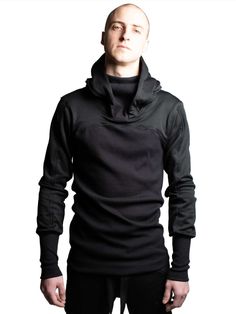 Functional Winter Tops With Funnel Neck, Functional Funnel Neck Winter Top, Techwear Sweatshirt With Ribbed Cuffs, Technical Winter Hoodie For Streetwear, Technical Long Sleeve Sweatshirt For Streetwear, Functional Long Sleeve Sweatshirt, Black Winter Outerwear With Thumbholes, Winter Techwear Sweater, Functional Funnel Neck Winter Hoodie