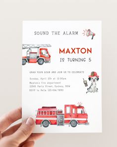 a hand holding up a card that says sound the alarm maxton is turning 5