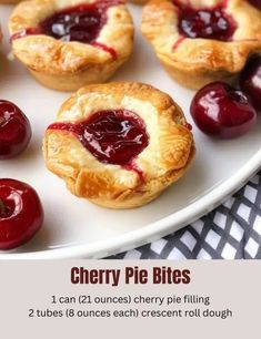 cherry pie bites on a white plate with cherries