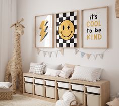 a child's room decorated in white and neutrals with pictures on the wall