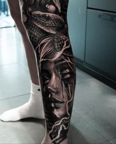 a person with a tattoo on their leg