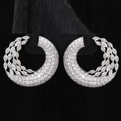 This fabulous Handmade Earrings is the right choice for you to dress to impress. It is made with 18k White Gold along with the Diamond studding and the spectacular design adds to its glittering. ✧✧Welcome To Our Shop Spectrum Jewels India✧✧ Gorgeous Diamond Hoops Earrings, 18K Gold Wedding Earrings, Handmade Women Jewelry, Cluster Earrings, Statement Earrings, Valentine's Gifts ★PRODUCT SPECIFICATION★ * ITEM CODE - SEE-12841B * METAL - 18k White Gold * 18k White Gold Weight : 13.85 gm  * GROSS W Evening Bridal Earrings With Diamond Cut, Hand Set Round Earrings For Evening, Exquisite Evening Bridal Earrings, Exquisite Round Evening Earrings, Diamond Hoops Earrings, Gold Wedding Earrings, Diamond Earrings Design, Gold Earrings Wedding, Valentine's Gifts