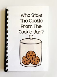 a notebook with an image of cookies in a jar on the front and bottom, which reads who stole the cookie from the cookie jar?