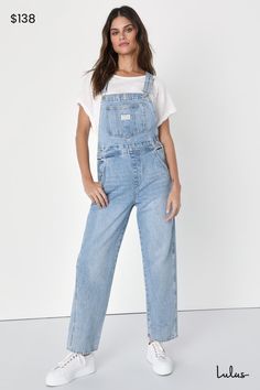 The Levi's Vintage Medium Wash Overalls are a tried and true staple that we know you're going to love! Sturdy denim (in Levi's What A Delight wash) shapes these classic overalls that have a front bib with a patch pocket and adjustable straps that form into a modified racerback. A seamed waist tops relaxed fit straight leg bottoms with two front pockets and two back pockets. Branded button closures at the hips. Red logo tag at back. Fit: This garment fits true to size. Length: Ankle length. Size Granola Fits, Mom Inspo, Fashion Overalls, Denim Photoshoot, Womens Overalls, Overalls Blue, 90s Mom, 7 Months Pregnant, Cute Overalls