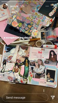 the contents of a scrapbook laying on top of a table