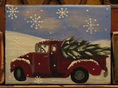 an old red truck with a christmas tree in the back is painted on wood and has snowflakes