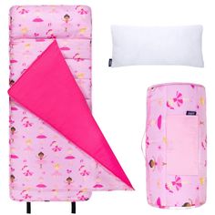 a pink sleeping bag and pillow next to it