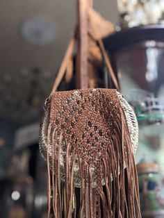 "Vintage fringed leather shoulder bag Fantastic Bag, handmade, witg fringed leather and straw. Zipper working. With some small signs of use....like you can see at pics. In good condition! Measures: - Total long wih fringed: 18.89\"(48 cm) - Diameter: 10.23\" (26 cm) - Strap: 40.15 (102 cm) Thanks for stopping by!!" Bohemian Shoulder Bag With Woven Leather, Bohemian Leather Straw Bag Woven, Bohemian Leather Woven Straw Bag, Bohemian Leather Straw Bag, Bohemian Woven Leather Straw Bag, Bohemian Brown Straw Bag For Market, Bohemian Brown Straw Bag With Woven Leather, Brown Bohemian Straw Bag With Woven Leather, Bohemian Straw Bag With Fringe For Travel